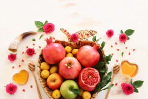 Basket of pomegranates and apples for Rosh Hashanah